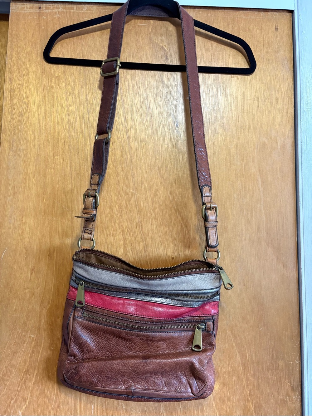 Large Fossil Brown Leather Crossbody Bag with Red, Silver Accent